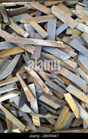 slate stone blocks. many different shapes and colors. piled up Stock Photo