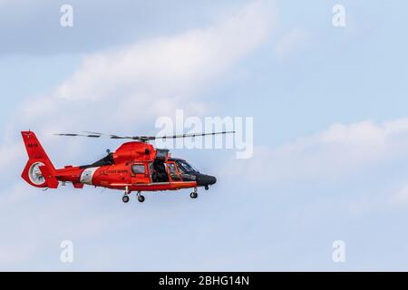 US Coast Guard MH-65 Dolphin Helicopter search and rescue demonstration at 2019 Wings Over Houston airshow, Houston, Texas. Stock Photo