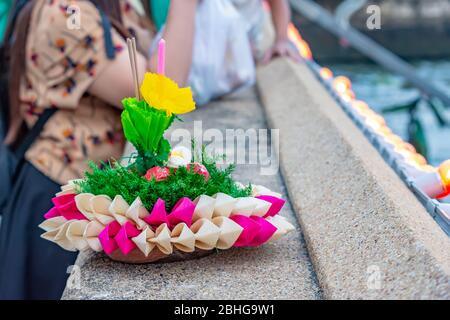 decorated float made from natural materials that is going to drop down the river. Stock Photo