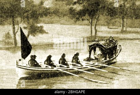 A press photograph of the Royal barge of King George V & Queen Mary during the Peace Pageant after WWI in 1919 sailing on the Thames to celebrate and mark the end of World War 1. A Bank Holiday was declared throughout Britain Stock Photo