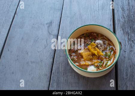 Spicy noodle soup with pork, put the Pinto. Stock Photo