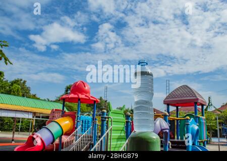 Drink water and bright blue sky In the playground. Stock Photo
