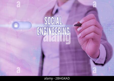 Writing note showing Social Engineering. Business concept for Psychological Manipulation Gain Access thru Fraud Stock Photo