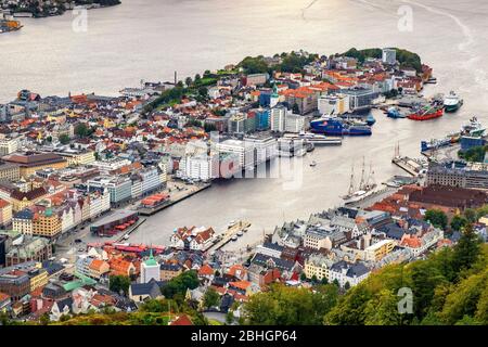 Bergen, Hordaland / Norway - 2019/09/03: Panoramic city view with Bergen Vagen harbor - Bergen Havn - and historic Bryggen heritage district seen from Stock Photo