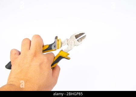 Side cutters with yellow and grey handle on white background. Stock Photo