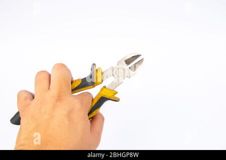 Side cutters with yellow and grey handle on white background. Stock Photo