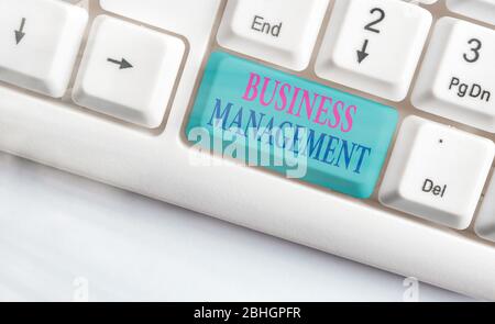 Conceptual hand writing showing Business Management. Concept meaning Overseeing Supervising Coordinating Business Operations Stock Photo