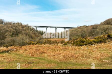 The disused Meldon railway viaduct (1874) carried the London and South Western Railway over the West Okement River in Dartmoor.  Devon, England, UK. Stock Photo