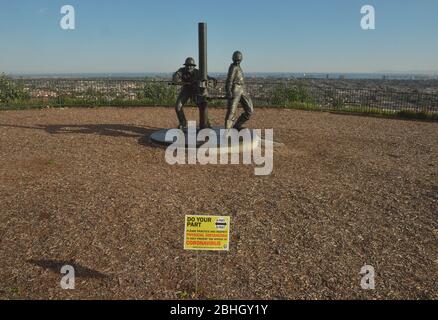 Los Angeles, United States. 26th Apr, 2020. A sign asks visitors to maintain a safe social distance due to the COVID-19 crisis at a neighborhood park near Signal Hill in Long Beach, California on Saturday, April 25, 2020. The Long Beach Oil Field, had the world's highest oil production per acre by the mid-twentieth century. Hundreds of companies and individuals became rich on minute leases, some locations so close that derrick legs overlapped. New housing and stores are now being built among operating oil wells. Photo by Jim Ruymen/UPI Credit: UPI/Alamy Live News Stock Photo