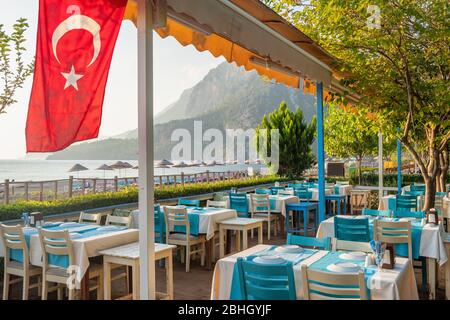 Empty restaurant on the Cirali beach at Mediterranean coast in Turkey Stock Photo