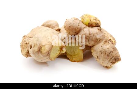 Close-up Of Ginger Over White Background Stock Photo