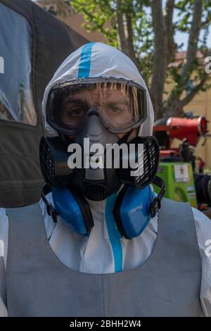 VERONA, ITALY - APRIL 24: Italian army soldier sanitises a Court at Verona Tribunal Stock Photo