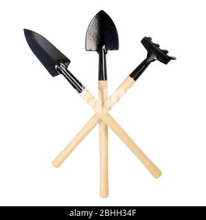 Gardening tools, shovels, rake isolated on white Stock Photo