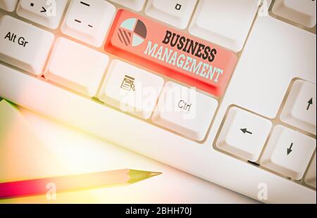 Conceptual hand writing showing Business Management. Concept meaning Overseeing Supervising Coordinating Business Operations Stock Photo