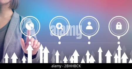 Woman pointing at virtual screen with finger Stock Photo