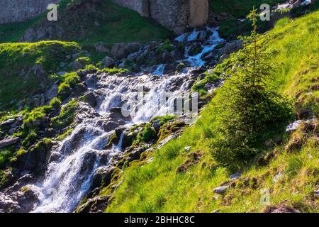 cascade of balea stream. nature scenery of fagaras mountains on a sunny summer day Stock Photo