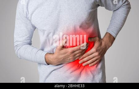 Pain in liver is highlighted in red Stock Photo