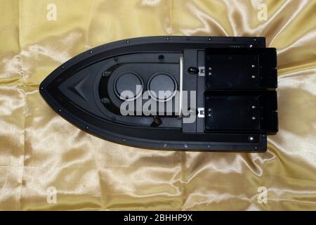 Image of one of the remote-controlled boats on the pond . Stock Photo