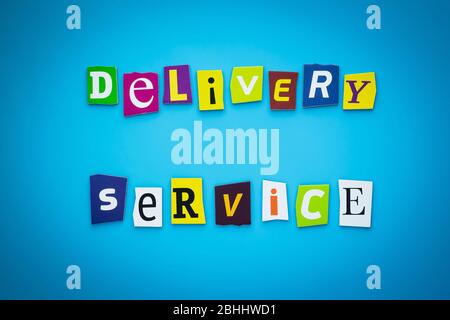 A word writing text - delivery service. Cartoon colorful letters on a blue background. Headline, banner with inscription font Stock Photo