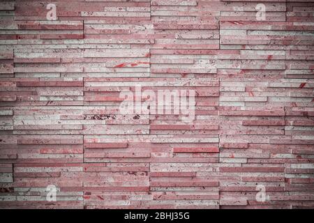 modern wall, reddish background with flecks and vignette. Stock Photo