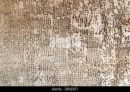 plaster background, modern aged texture, black and yellow and white pattern. Abstraction. Stock Photo