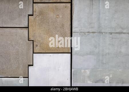 Solid wall background made of concrete blocks with gaps Stock Photo