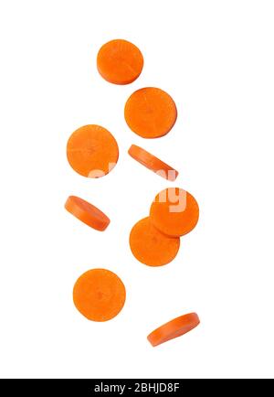 Falling carrot slice isolated on white background with clipping path. Stock Photo