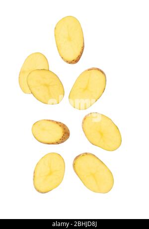 Falling potato slice isolated on white background with clipping path. Stock Photo