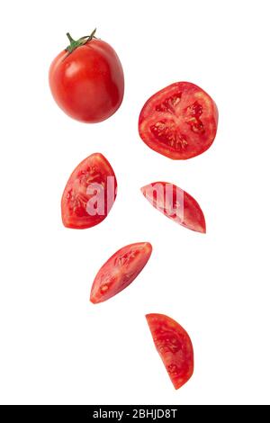 Falling tomato slice isolated on white background with clipping path. Stock Photo