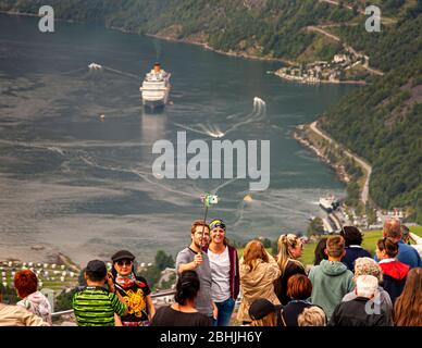 Cruise passengers during shore excursion in Geiranger fjord, Norway