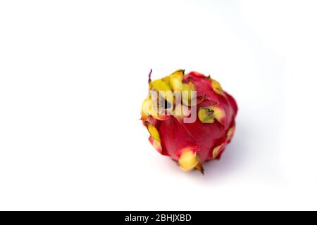 Closeup shot fresh whole dragon fruit isolated on white background. Exotic Thai Fruit. Pitaya. Healthy food. Stock Photo