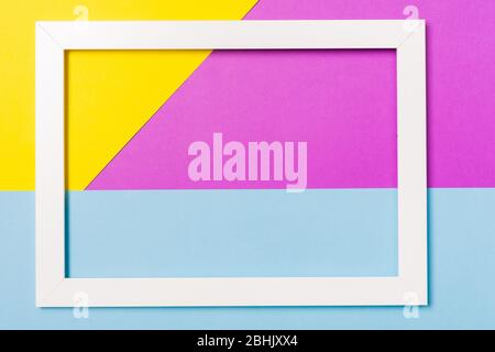 Abstract geometrical flat lay background with white picture frame. Minimalism, geometry and template with empty picture frame mock up. Free space Stock Photo