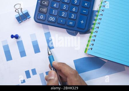 businessman analyzing working on office desk, top view  Stock Photo