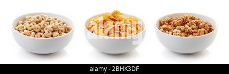 Three bowls of different cereals isolated on white background Stock Photo