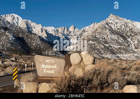 Sign marking the entrance to the Inyo National Forest near Lone Pine approaching Mount Whitney, California