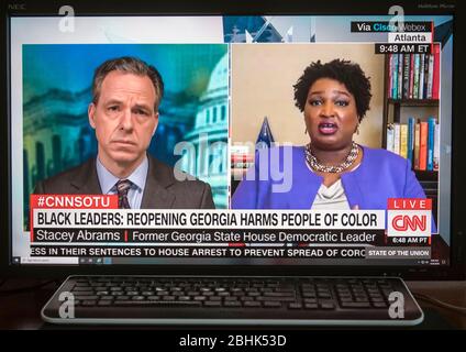 April 26, 2020 - Atlanta, Georgia, USA: A screen grab of former Georgia gubernatorial candidate STACEY ABRAMS, right, being interviewed by JAKE TAPPER on CNN's 'State of the Union'. Credit: Brian Cahn/ZUMA Wire/Alamy Live News Stock Photo