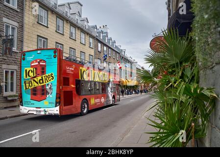 Quebec city, Canada september 23, 2018: Red sightseeing double deck bus in Porte Saint Louis, one of the famous tourist attraction UNESCO World Stock Photo