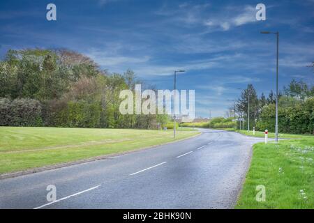 Looking over to the normally busy  Stewarton Road (B769) that is deserted during cover-19 lockdown period. Stock Photo