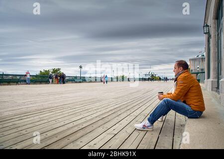 Quebec city, Canada september 23, 2018: sightseers and tourists enjoy a leisurely stroll along Terrasse Dufferin in Quebec City's old town Stock Photo