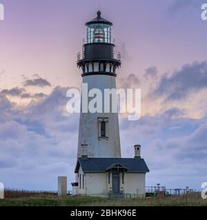 Sunset Over Yaquina Head Lighthouse along Oregon coast Stock Photo