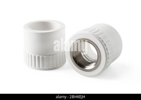 Combined couplings for connecting metal and polypropylene water pipes isolated on white Stock Photo