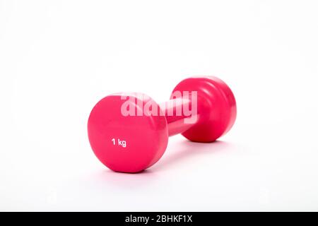 Pink 1KG dumbbell isolated on a white background Stock Photo