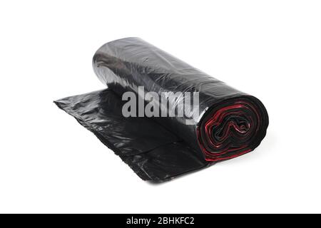 Roll of black plastic trash bags isolated on white background Stock Photo