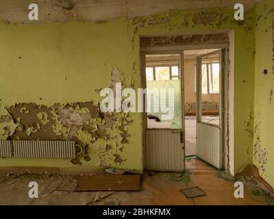 Abandoned interior house in ruins, construction and architecture. Chernobyl Exclusion Zone. Ukraine Stock Photo