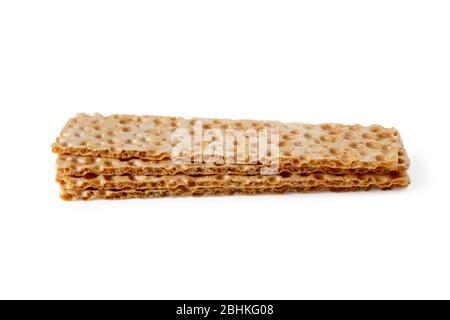 Stack of wheat crackers isolated on white Stock Photo