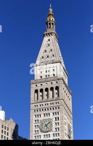 Metropolitan Life Insurance Company Tower, New York, NY. The Met Life Clock Tower in Madison Square Park set against a sunny sky. Stock Photo