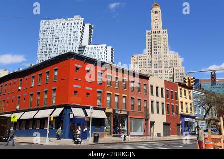 Colorful buildings along Atlantic Avenue in Downtown Brooklyn, New York with One Hanson Place, and 300 Ashland Place in the background. Stock Photo