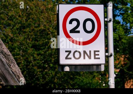 20 miles per hour zone sign in Bugbrooke, Northamptonshire Stock Photo