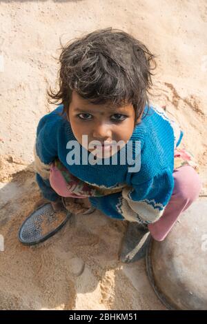 portrait of happy poor child in rural part of India Stock Photo