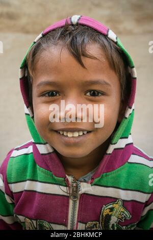 portrait of happy indian boy in rural part of india Stock Photo